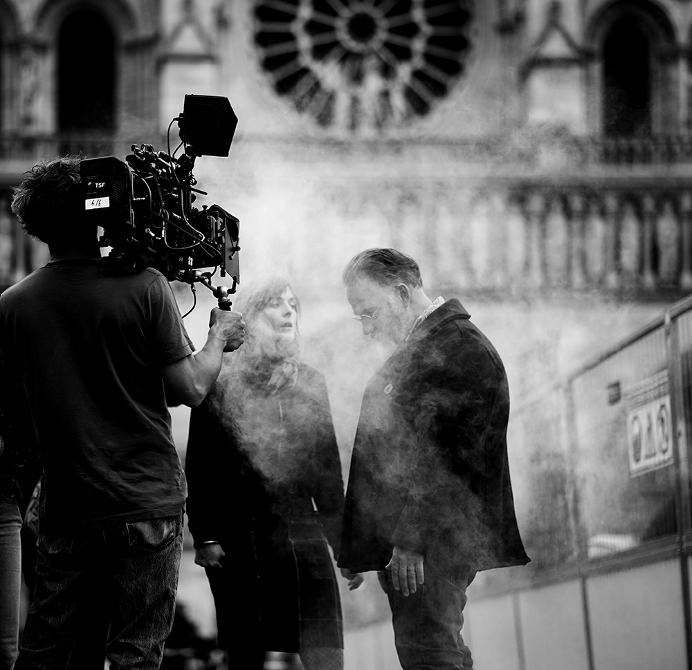 Christophe-Brachet-male-and-female-actors-in-a-smoky-street-scene.jpg