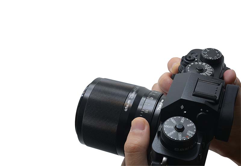 Tokina lens mounted to Fujifilm