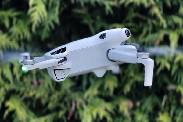 DJI Mini 4 Pro Drone Hovering close to ground