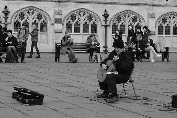 Man playing guitar in the street