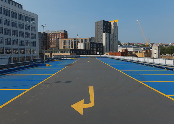 Car park in Bristol with large arrow on the floor