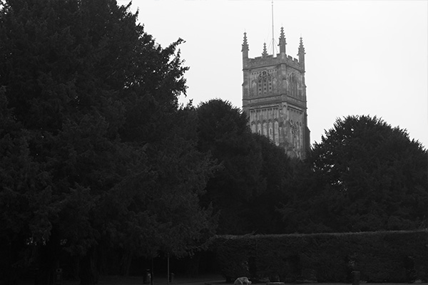 Cirencester Cathedral through Trees