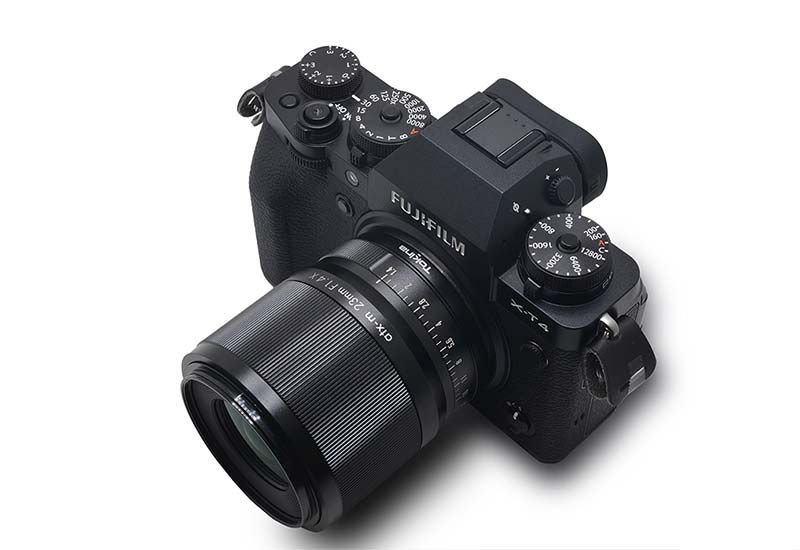 Tokina lens mounted to Fuji camera