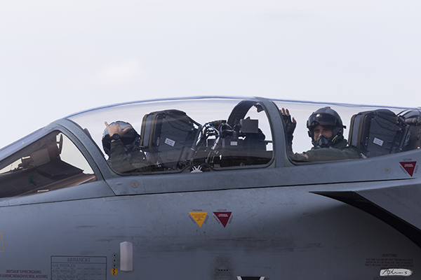 Pilots waving as they arrive into RIAT in their aircraft