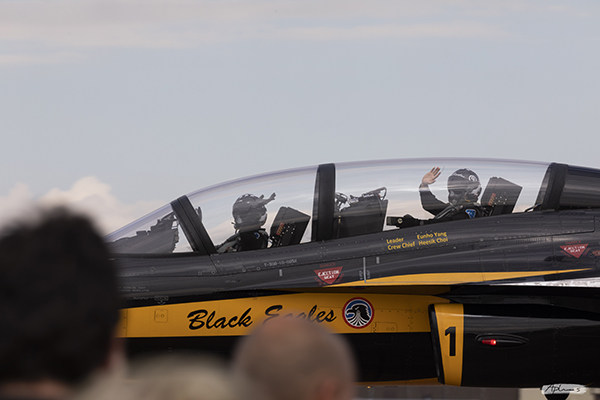Pilots waving as they arrive into RIAT in a Black Eagle aircraft