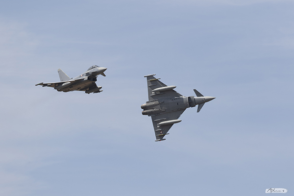 Two aircrafts passing while flying at RIAT 2022
