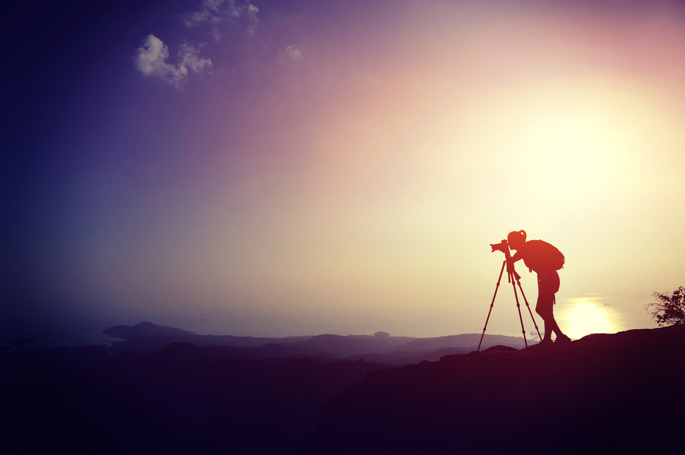 sunset silhouette photography with photographer and tripod